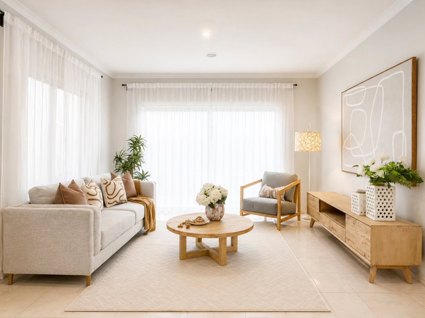 A light-filled living room styled by Tailored Property Styling